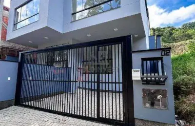 Sobrado com 2 suítes no bairro nova brasília (financia minha casa minha vida)
