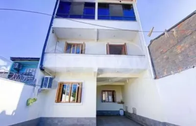 Casa com 3 quartos à venda na rua antonio pedro baldasso, 69, rubem berta, porto alegre por r$ 379.000
