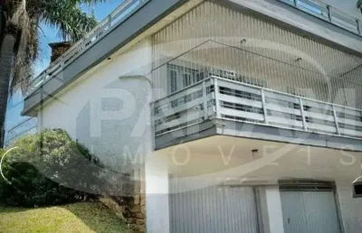 Casa com 4 quartos à venda na avenida benno mentz, 897, vila ipiranga, porto alegre por r$ 1.100.000