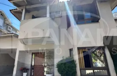 Casa com 3 quartos à venda na avenida ecoville, 209, sarandi, porto alegre por r$ 890.000