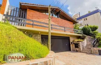 Casa com 4 quartos à venda na travessa java, 76, jardim lindóia, porto alegre por r$ 1.185.000