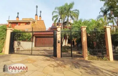 Casa com 4 quartos à venda na rua doutor barbosa gonçalves, 610, chácara das pedras, porto alegre por r$ 2.990.000