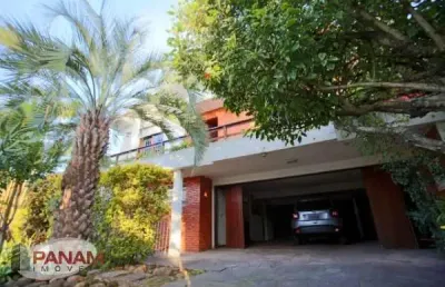 Casa com 3 quartos à venda na rua líbia, 29, vila ipiranga, porto alegre por r$ 970.000