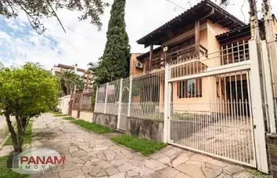 Casa com 4 quartos à venda na rua irmão augusto, 139, jardim lindóia, porto alegre por r$ 1.290.000