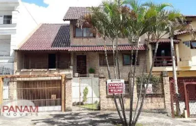 Casa com 5 quartos à venda na rua chafic joão scaf, 137, jardim itu sabará, porto alegre por r$ 2.120.000