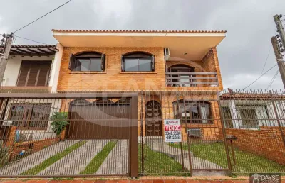 Casa com 5 quartos à venda na travessa von salisch, 90, sarandi, porto alegre por r$ 660.000