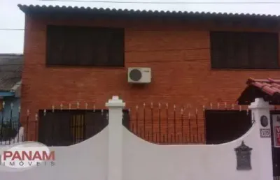 Casa com 4 quartos à venda na rua breno arruda, 105, santa maria goretti, porto alegre por r$ 649.000