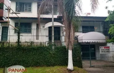 Casa com 3 quartos à venda na avenida quito, 415, jardim lindóia, porto alegre por r$ 1.590.000