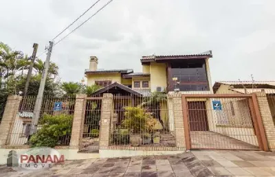 Casa com 4 quartos à venda na travessa porto príncipe, 59, jardim lindóia, porto alegre por r$ 1.690.000