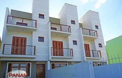 Casa com 3 quartos à venda na rua hugo nelson magalhães, 139, parque santa fé, porto alegre por r$ 544.000