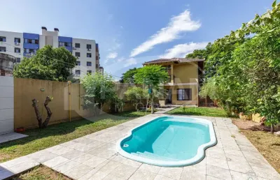 Casa com 3 quartos à venda na rua eugênio du pasquier, 283, cristo redentor, porto alegre por r$ 899.000