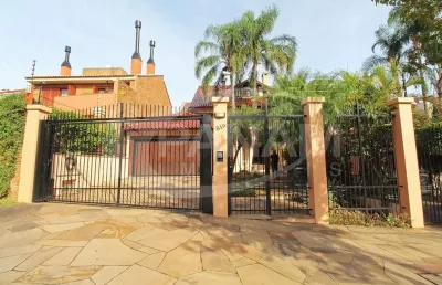 Casa com 4 quartos à venda na rua doutor barbosa gonçalves, 610, chácara das pedras, porto alegre por r$ 2.990.000