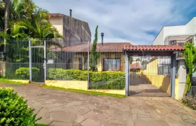 Casa com 4 quartos à venda na avenida general barreto viana, 303, chácara das pedras, porto alegre por r$ 1.330.000