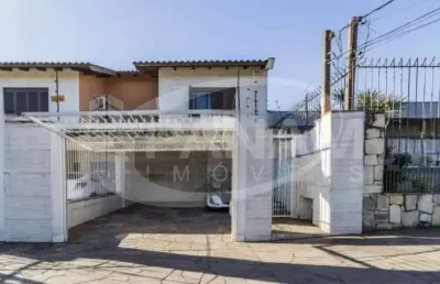 Casa com 3 quartos à venda na rua leopoldo bettiol, 146, jardim itu sabará, porto alegre por r$ 530.000