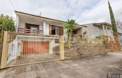 Casa com 3 quartos à venda na rua maestro salvador campanella, 70, jardim itu sabará, porto alegre por r$ 1.300.000