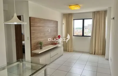 Aluga-se apartamento semi mobiliado com 59m2, 2/4 sendo um suíte.