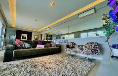 Lindo apartamento na praia da enseada com varanda gourmet