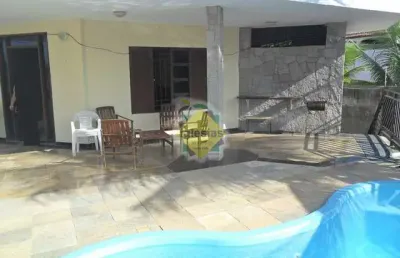 Casa na praia de cotovelo de 3 andares, 4 suítes, piscina e churrasqueira