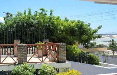 Casa de temporada frente/mar em ponta negra, vista, a 50 metros da praia, piscina, 3 quartos (1 suíte).