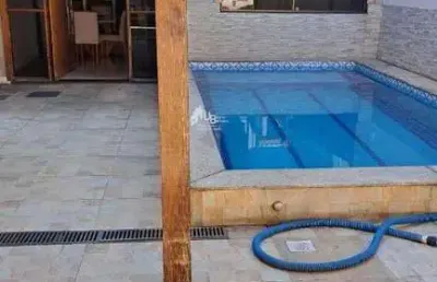 Magnifica casa de 4 quartos e área gourmet em todos os santos