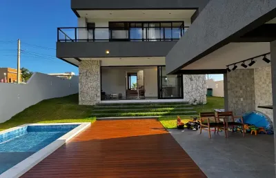 Excelente casa 4/4 suítes no alphaville litoral norte 3