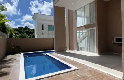 Excelente casa nascente 4/4 suítes no alphaville litoral norte 1