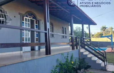 Casa linda com vista para lagoa na entrada da cidade.