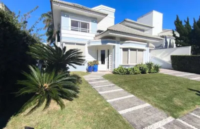 Casa com 4 quartos para alugar na rua dos cumurupis, 45, jurerê internacional, florianópolis, 300 m2 por r$ 22.000
