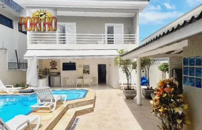 Maravilhosa casa na enseada frente total ao mar!!! 6 dormitórios