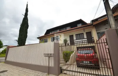 Casa com 3 quartos à venda na alexandre dalcuch, 156, bacacheri, curitiba por r$ 1.100.000