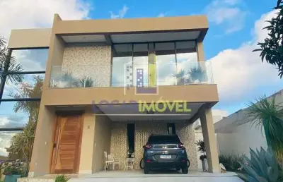 Linda casa de 4 quartos sendo 3 suítes mais dependência completa e 4 vagas de garagem no alphaville