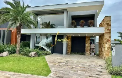 Casa condomínio nova com 04 suítes mobiliada e decorada