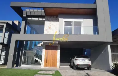 Sobrado  beira de lago condomínio fechado mobiliado e decorado com 4 suites