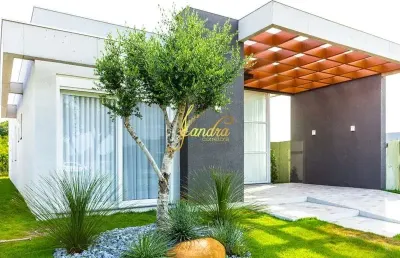 Casa em condomínio fechado com 4 suítes mobiliada/decorada com piscina