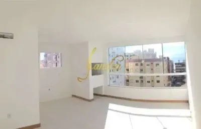 Apartamento padrão três dormitorios com móveis fixos e garagem