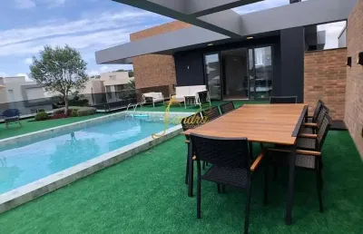 Sobrado em condomínio fechado mobiliado e decorado  piscina aérea com borda infinita