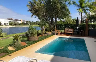 Sobrado beira de lago  com piscina aquecida com 05 suítes