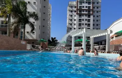 Apartamento com 01 suíte e mais 02 quartos em home club