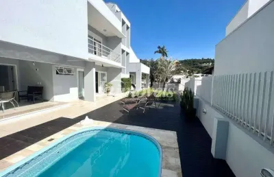 Sobrado alto padrão e semimobiliado à venda, 3 quartos sendo 2 suítes, 5 vagas, bairro cabeçudas, itajaí-sc