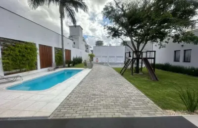 Casa mobiliada à venda ou locação, com piscina, jardim e quadra esportiva, 3 suítes, 7 vagas, bairro centro, itajaí-sc