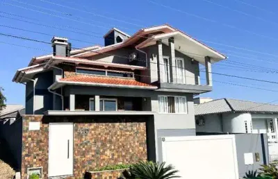 Casa 4 dormitórios suíte semi mobiliada 2 garagens criciúma jardim angélica