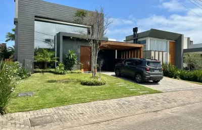 Linda casa à venda no condomínio dubai em capão da canoa!