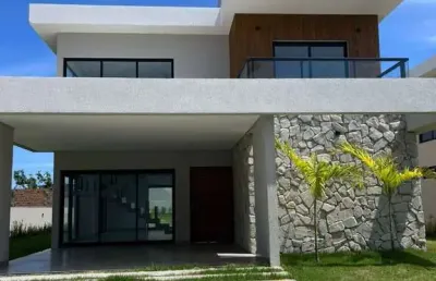 Casa com 4 quartos à venda na rua guarajuba, guarajuba, camaçari por r$ 1.330.000