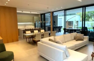 Casa térrea à  venda localizada no condomínio mosaico essence, mogi das cruzes. com 4 suítes, salas, área gourmet com piscina e churrasqueira, garagem