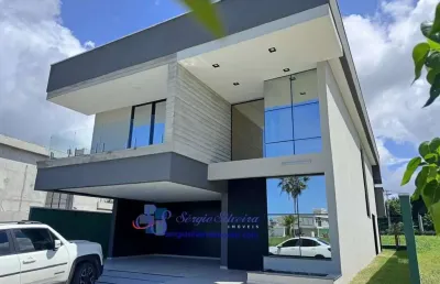 Casa de alto padrão com 5 suítes no eusébio com lazer completo.