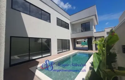 Belíssima casa com 4 suítes e piscina privativa no terras 1.