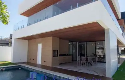 Linda casa duplex com 4 suítes e piscina privativa na cidade alpha