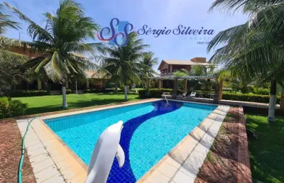 Casa no porto das dunas perto da praia com 5 suítes