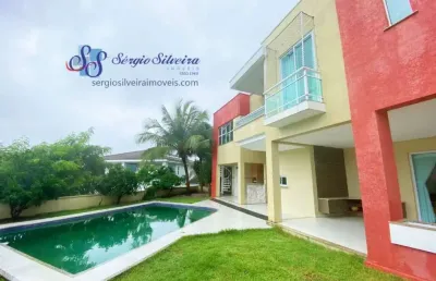 Casa no alphaville fortaleza, com 4 suítes, piscina com hidro, varanda gourmet.