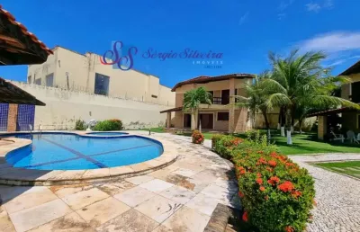 Excelente casa em condomínio fechado com 4 suítes no porto da dunas.